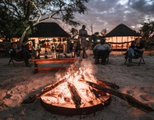 A campfire at the Mogogelo Camp enjoyed on a Botswana small group safari
