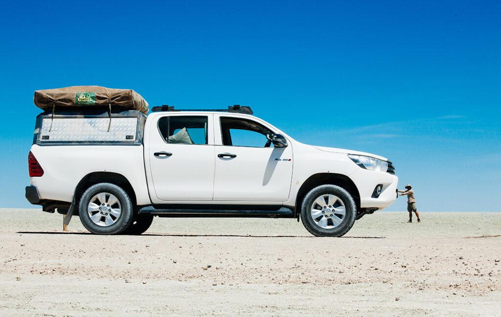 A 4x4 rental car in the pans used on guided self-drive safari tours in Botswana