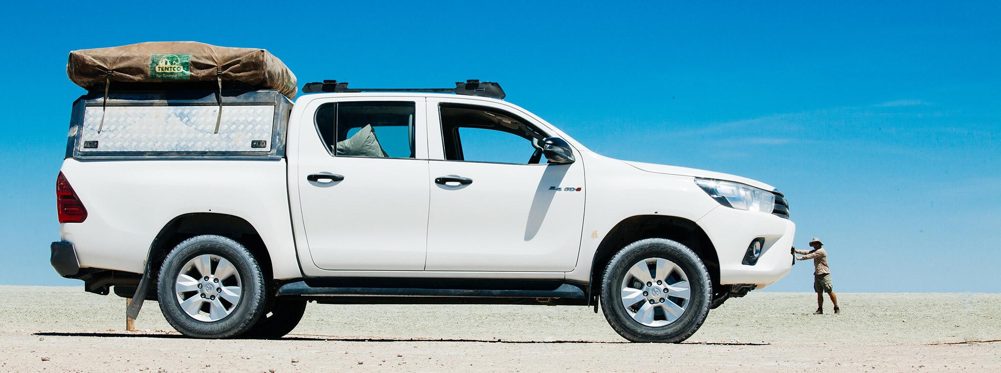 A 4x4 rental car in the pans used on guided self-drive safari tours in Botswana