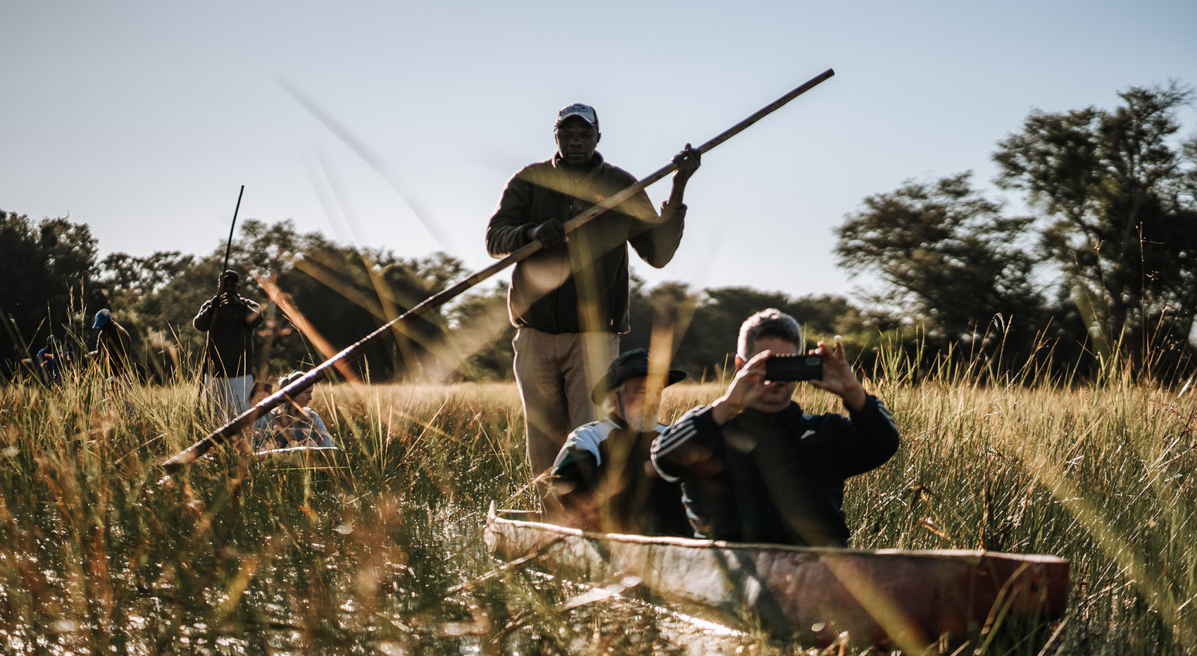 Guests in a Mokoro. Guests in a Mokoro.