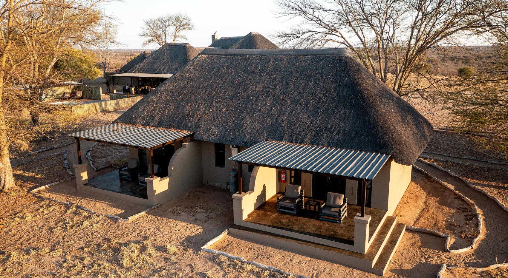 An arial shot of the cottages at The Dune Camp in Botswana. An arial shot of the cottages at The Dune Camp in Botswana.